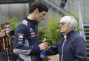 Mark Webber chats to Bernie Ecclestone in the paddock