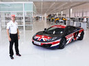 Jenson Button poses with a specially liveried McLaren MP4-12C to promote British innovation