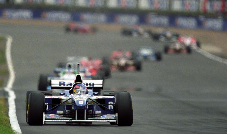 Jacques Villeneuve on his way to winning the British Grand Prix