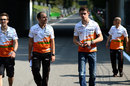 Paul di Resta walks the track with his Force India engineers