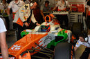Paul di Resta sits in the cockpit of his Force India