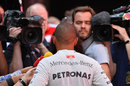 Lewis Hamilton talks to the press