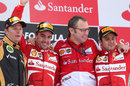 Kimi Raikkonen, Fernando Alonso, Stefano Domenicali and Felipe Massa celebrate on the podium