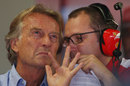 Stefano Domenicali talks with Luca di Montezemolo in the Ferrari garage