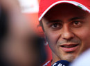 Felipe Massa talks to the press