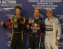 Sebastian Vettel celebrates pole position ahead of Nico Rosberg and Romain Grosjean
