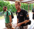 Sebastian Vettel arrives in the paddock ahead of Sunday's race