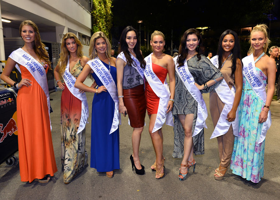 Miss Universe contestants in the paddock