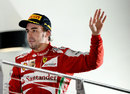 Fernando Alonso waves to the crowd