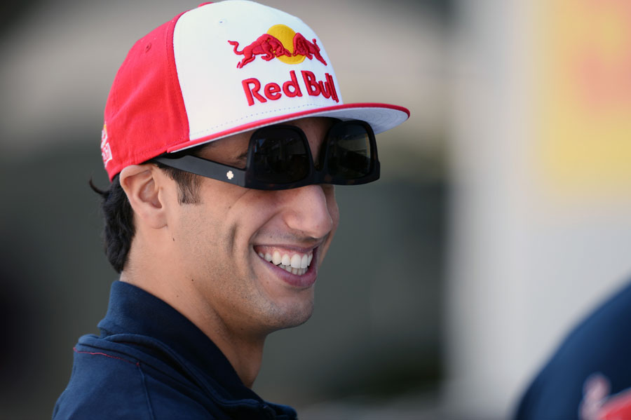 Daniel Ricciardo jokes around in the paddock on Thursday