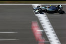 Lewis Hamilton crosses the line to start another lap