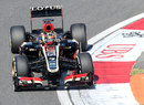 Kimi Raikkonen coaxes the front end of his Lotus towards the apex