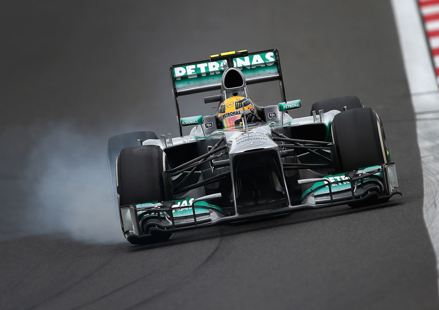 Lewis Hamilton locks up his front-right tyre