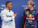 Sebastian Vettel and Lewis Hamilton share a joke