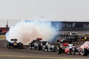 Mark Webber leaves a trail of smoke