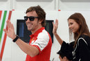 Fernando Alonso arrives at the circuit with his girlfriend