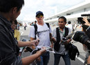 Kimi Raikkonen arrives at Suzuka on Thursday morning