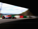 Sebastian Vettel heads under the flyover