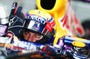 Mark Webber prepares in the cockpit of his RB9