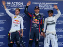 The top three salute the crowd in parc ferme
