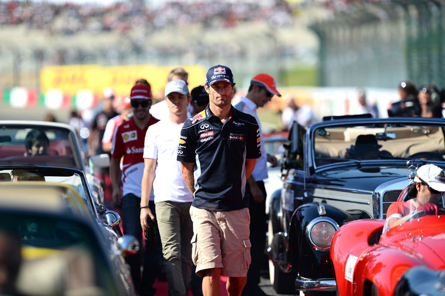Mark Webber leads the drivers out for the drivers' parade