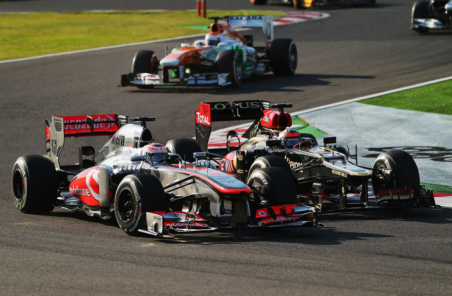 Kimi Raikkonen and Jenson Button go wheel-to-wheel