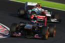 Daniel Ricciardo leads Adrian Sutil on track