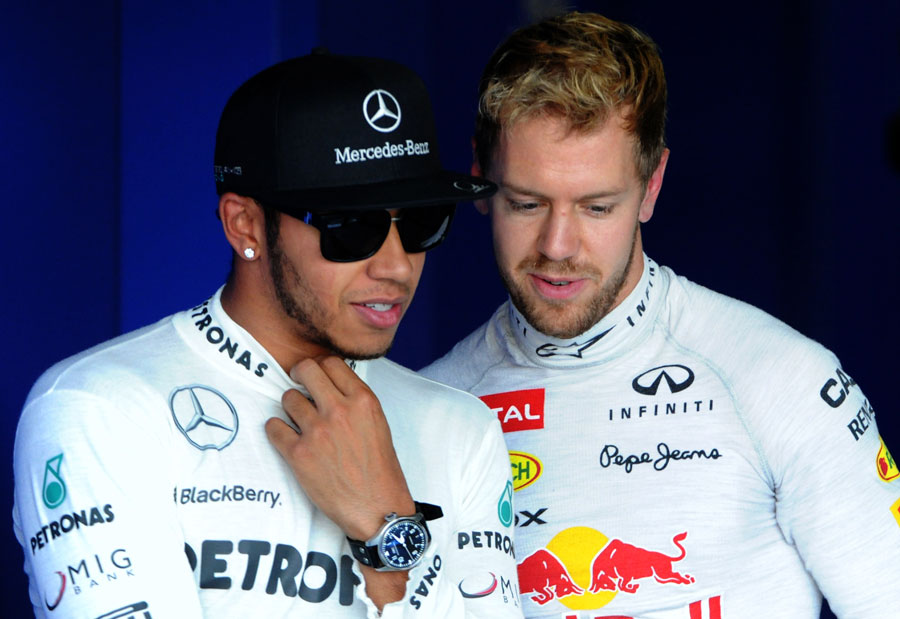 Lewis Hamilton and Sebastian Vettel chat after qualifying