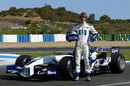 Sebastian Vettel poses ahead of his first test in a Formula One car