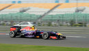 Mark Webber passes an empty grandstand