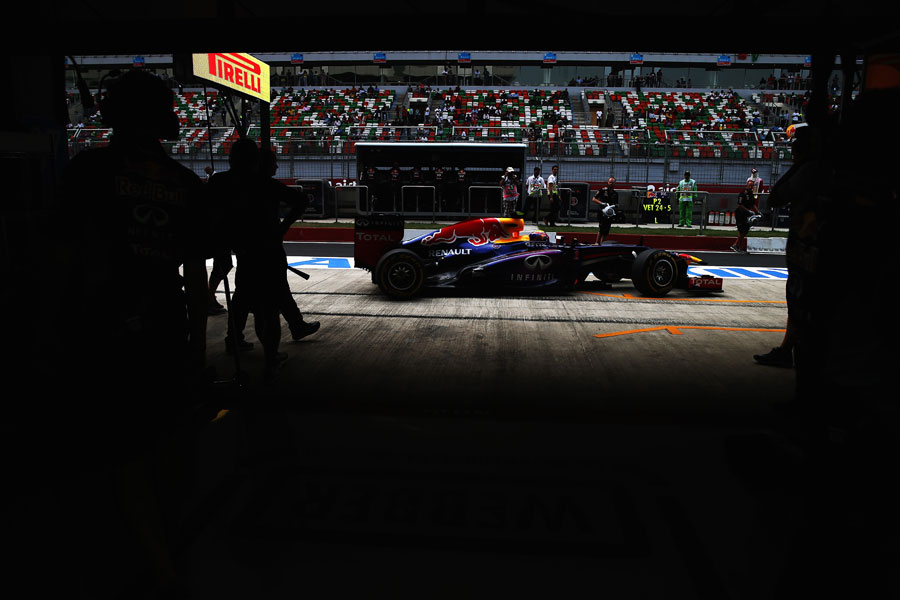 Mark Webber returns to the Red Bull garage