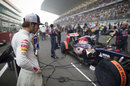 Jean-Eric Vergne inspects his car on the grid