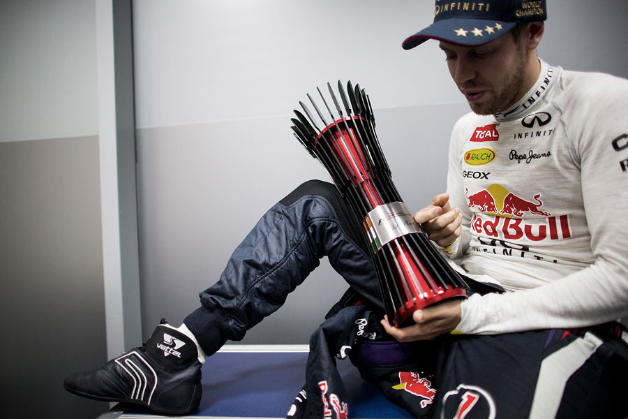 Sebastian Vettel reflects quietly in the Red Bull garage after the race