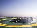 David Coulthard displays a Red Bull on top of the Burj Al Arab helipad 