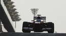 Fernando Alonso heads down the pit lane