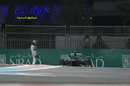 Lewis Hamilton stares at his stricken Mercedes after spinning during qualifying
