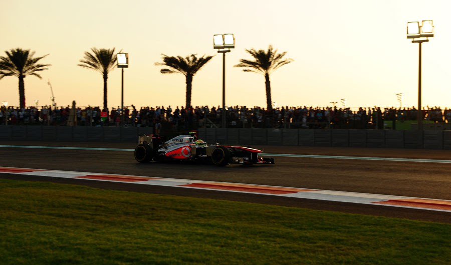 Sergio Perez on track as the sun begins to set