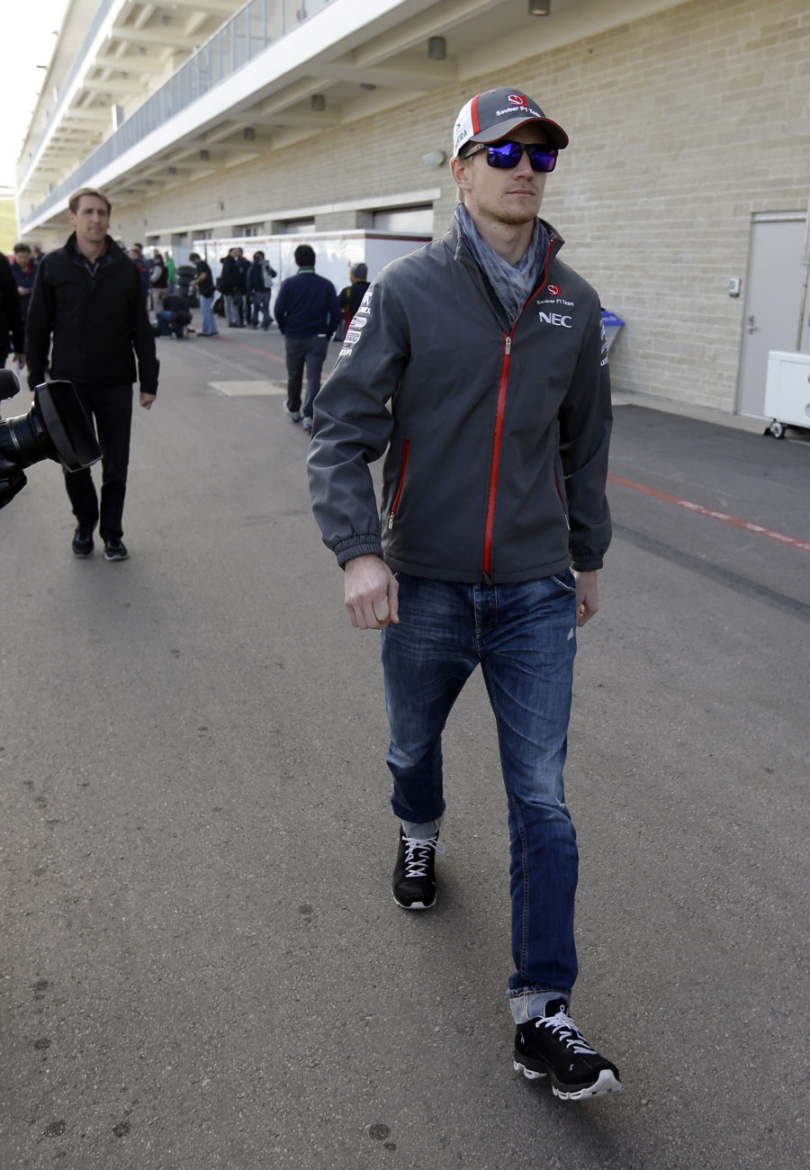 Nico Hulkenberg walks through the paddock on Thursday morning