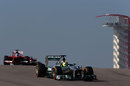 Nico Rosberg leads Fernando Alonso on track