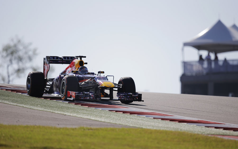 Sebastian Vettel heads downhill out of Turn 1