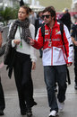 Fernando Alonso arrives in the paddock with girlfriend Dasha Kapustina