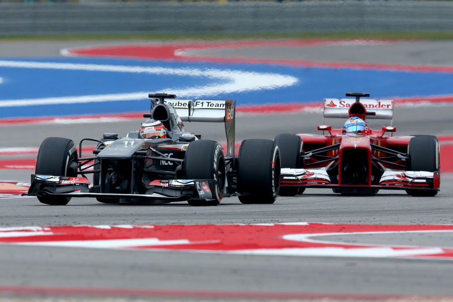 Nico Hulkenberg leads Fernando Alonso on track