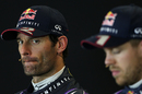 Mark Webber casts a glance at Sebastian Vettel after his teammate pipped him to pole