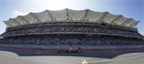 Sebastian Vettel speeds past the main grandstand