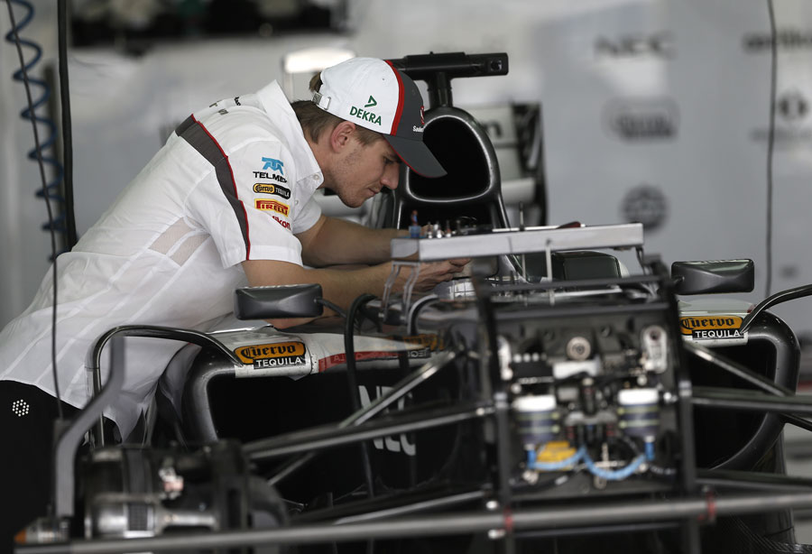 Nico Hulkenberg peers in to his Sauber
