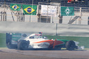 Adrian Sutil spins and loses places at the start
