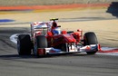 Fernando Alonso drives his Ferrari