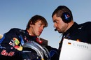 Sebastian Vettel talks to his race engineer