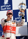 Lewis Hamilton celebrates his podium finish