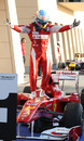 A delighted Fernando Alonso climbs from his car